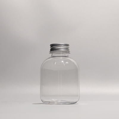 Customized Round Plastic PET Bottle PET Juice Bottles Aluminum Cap Tight Sealing With Logo Printing